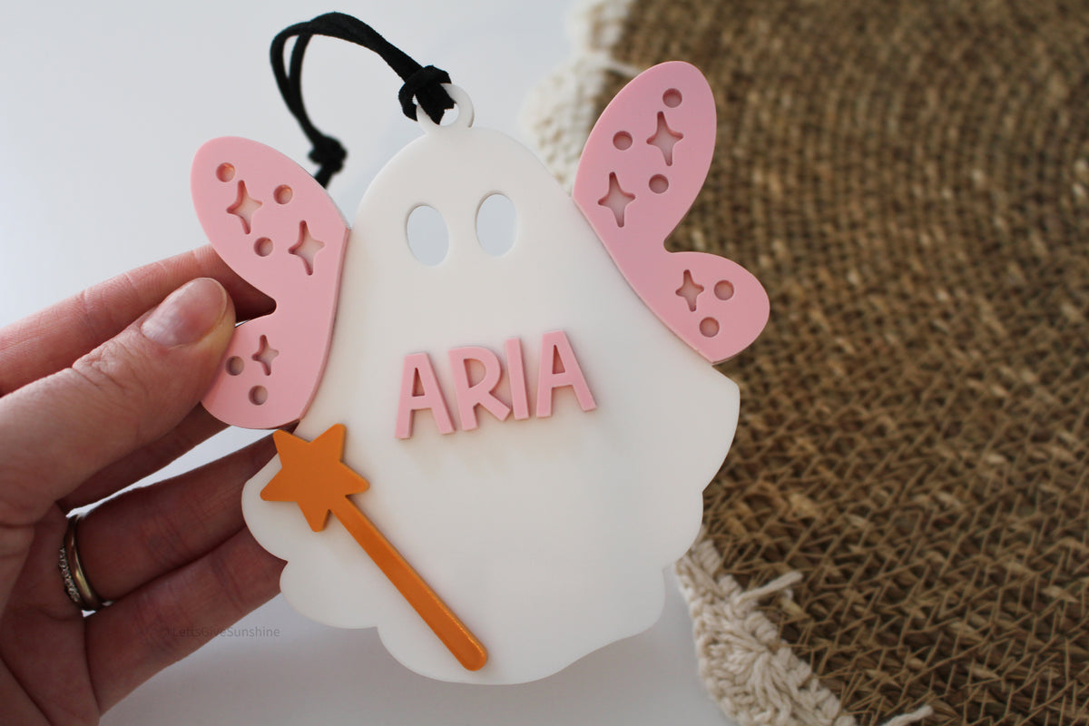 Personalized Halloween ghost name tag for kids with fairy wings and star wand, made for Boo Baskets and trick-or-treat bags