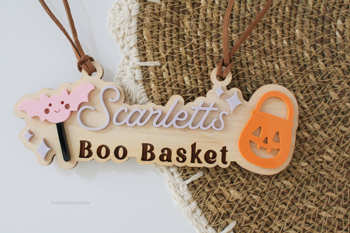Personalized wooden Boo Basket tag with child’s name, pink bat and orange pumpkin bucket Halloween design