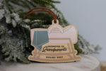 Grandparents pregnancy announcement Christmas ornament made from natural wood, featuring a rocking cradle, baby blanket and the words Promoted to Grandparents Begins 2027.