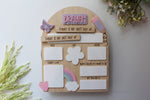 Personalized wooden first and last day of school board with the name Brayah, pastel rainbow, butterfly, hearts, and reusable dry-erase spaces for grade, date, age, height, favourite things, future dream, and teacher