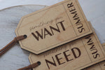 Personalized wooden Christmas gift tags showing Something You Want and Something You Need with Summer engraved on the ends.