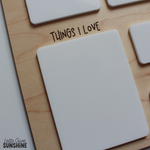 Close-up of the white dry erase “Things I Love” section on a personalized wooden first day of school milestone board, designed to be filled in and reused each year.